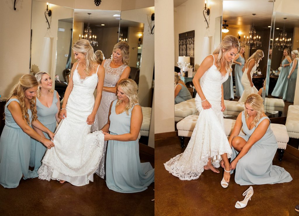 Bridesmaids helping bride into wedding heels