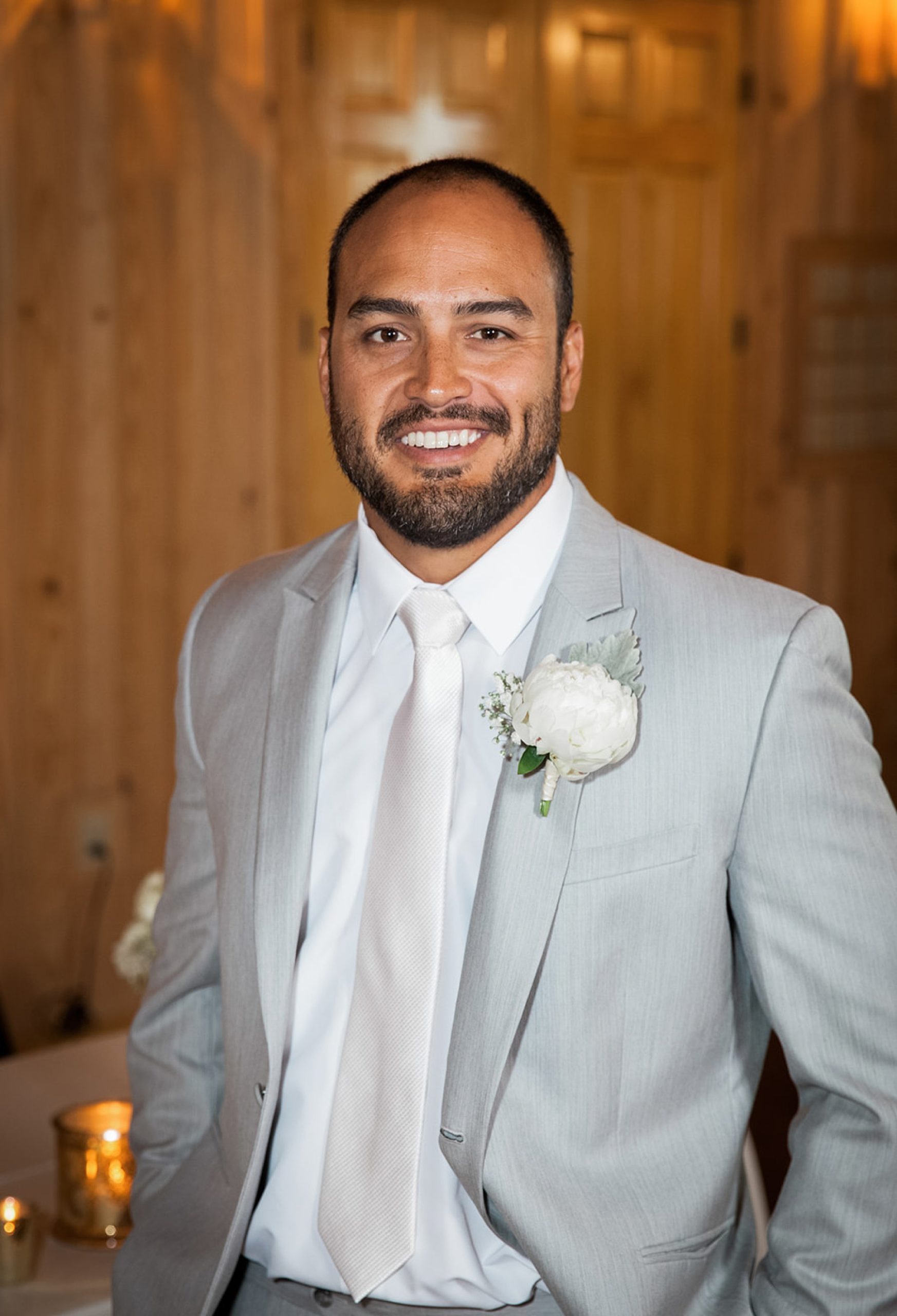 Groom portrait in grey and white suit