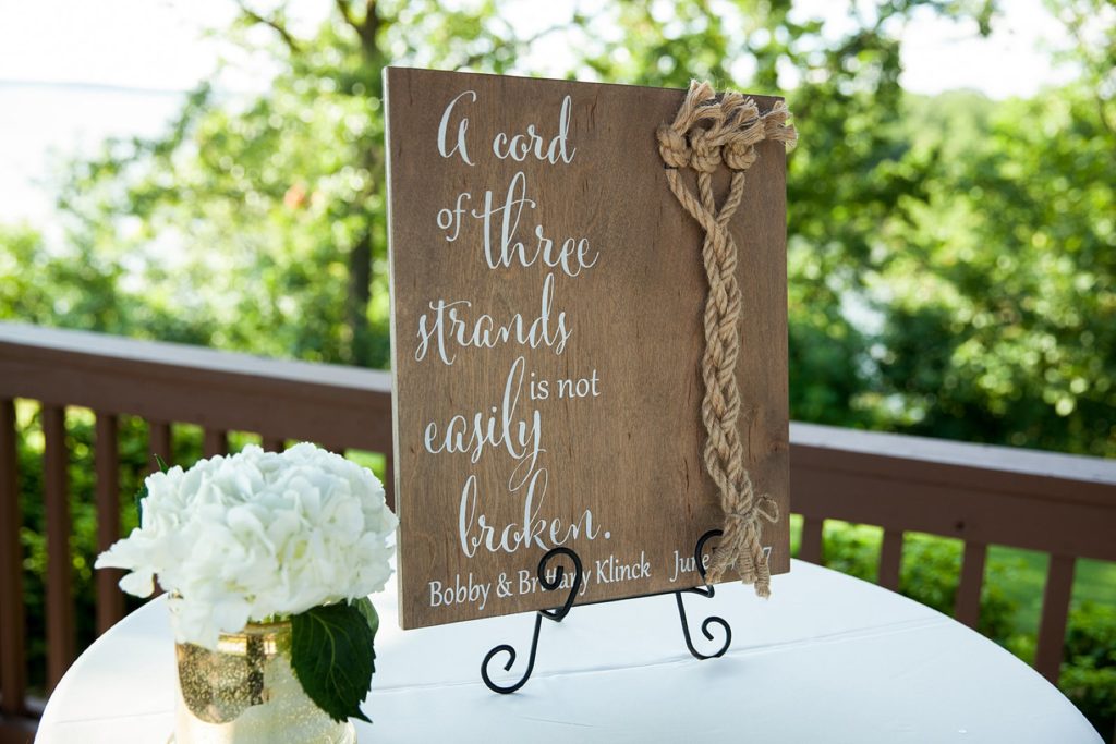 A cord of three strands is not easily broken wedding ceremony sign
